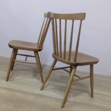 Set of Four Vintage Spindle Back Dining Kitchen Chairs Super set of four vintage spindle back dining kitchen chairs in elm and beech. Very similar to Ercol